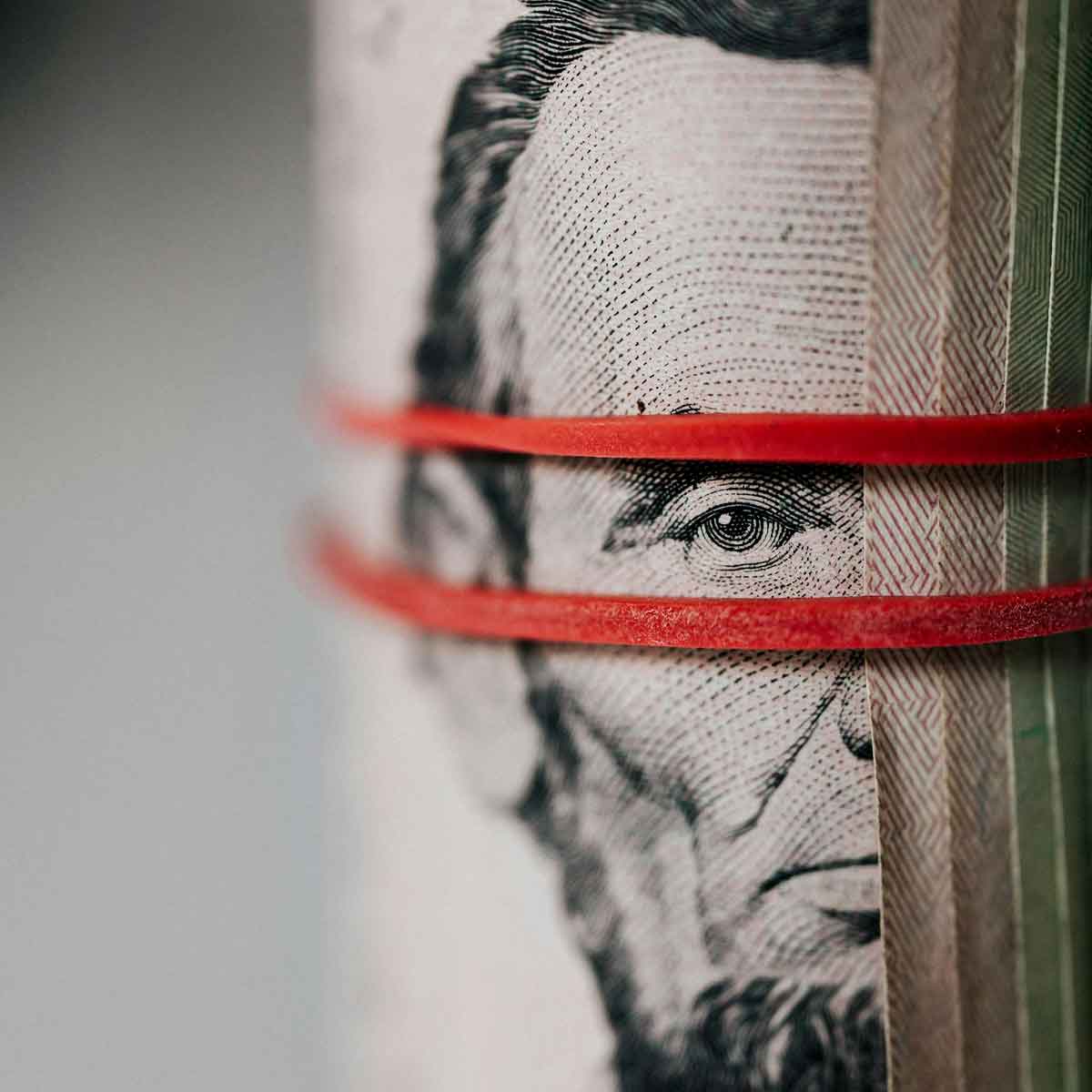 Close up of Lincoln's eyes on the five dollar bill